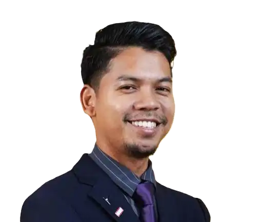Smiling man in a suit and tie, with short black hair, beard, and mustache, against a white background. CK Media